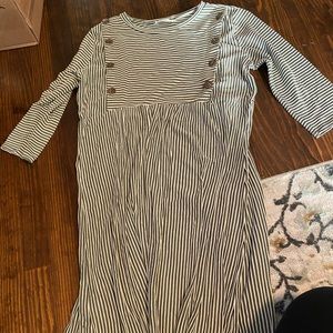 Bates sisters boutique, brand is Reborn J. Buttons come undone for nursing.